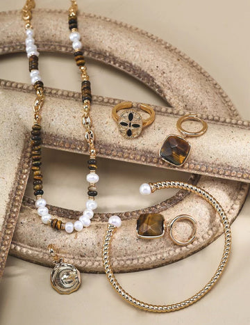 The pearl tiger's eye retro necklace is like an elegant classical beauty, coming in the long river of time.