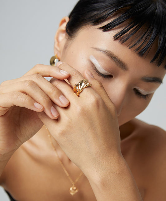 Sterling silver wide face ring The combination of the two sides of the lava-like flow and the undulating irregular design in the middle is full of luster and texture.