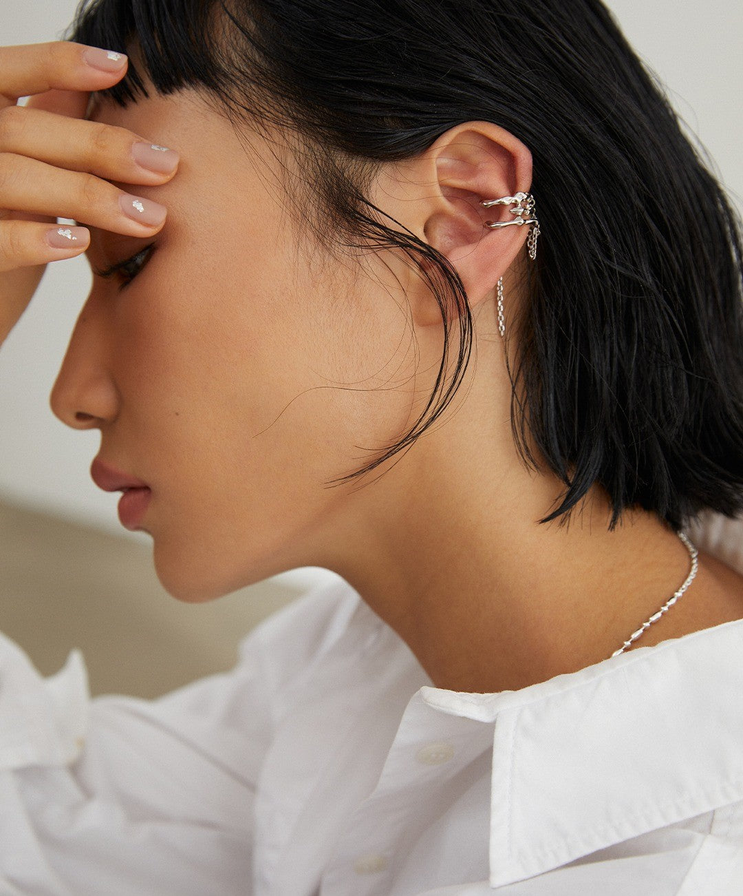 Sterling silver ear bone clip (sold alone Tassel ear clips, irregular surface design, concave and convex refraction dazzling gaze, cold ins style personality has temperament.