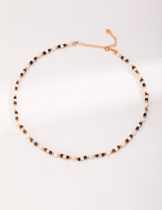 Vintage gold necklace The coldness of the mother's shell, the softness of the pearl, and the splendor of the tiger's eye combine the romance of the Middle Ages, and the sorting of rules is only to reflect the exquisite pursuit of beauty.