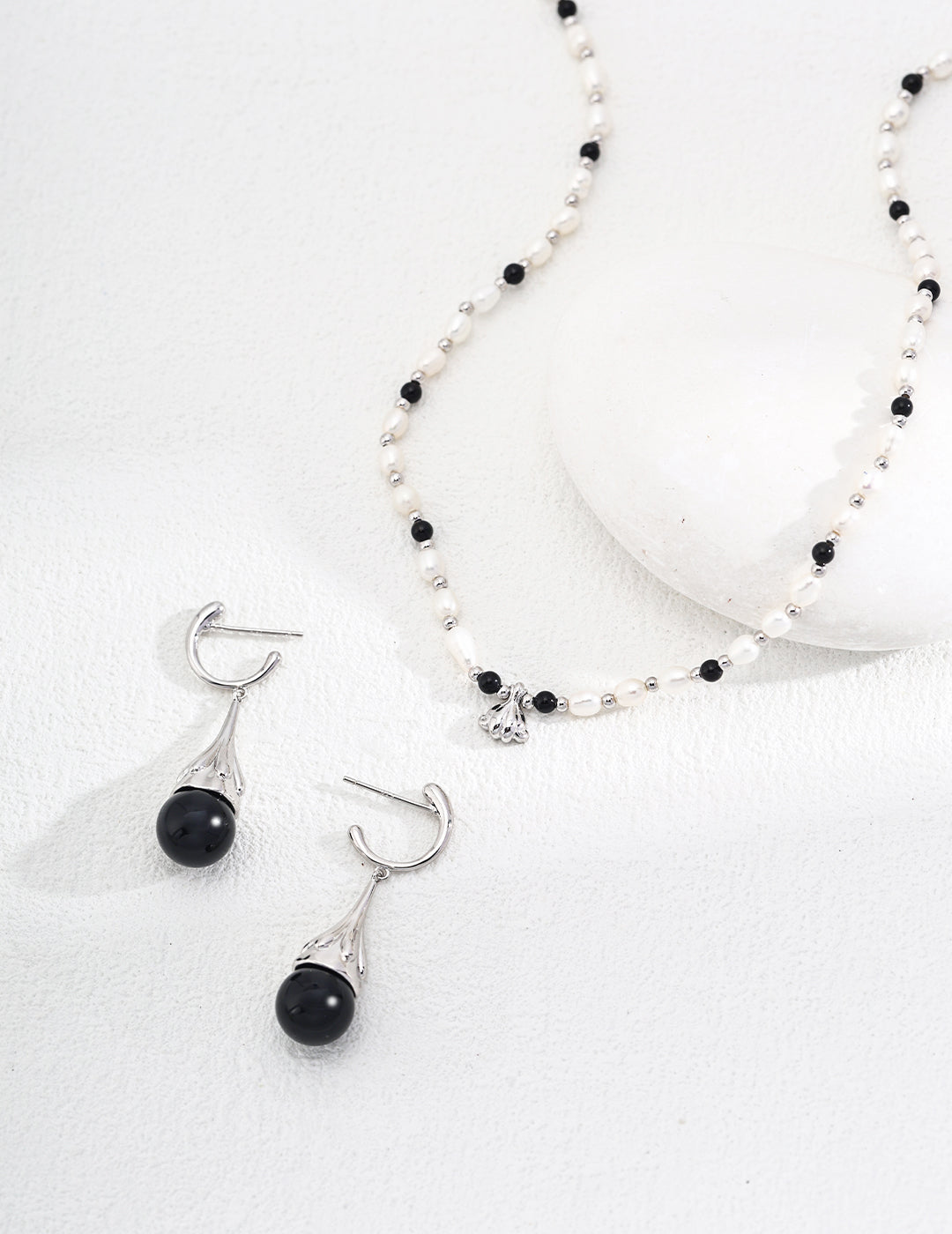 Sterling silver black onyx/tiger's eye earrings