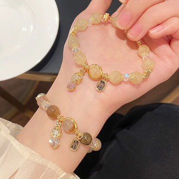 Natural blonde crystal moonstone bracelet gold swallowing beast titanium crystal